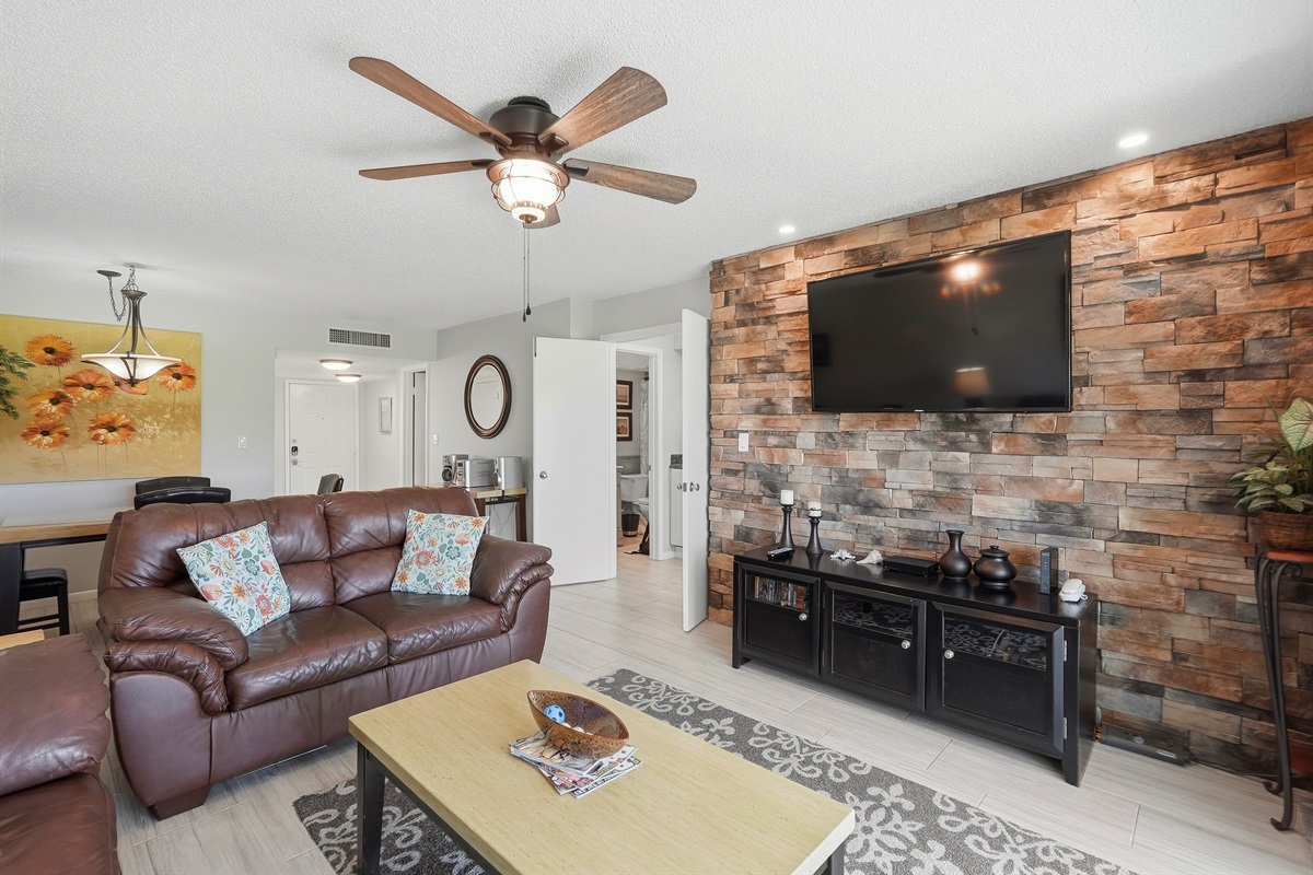 Spacious and sunlit, the living room is ideal for unwinding, streaming your favorite shows, or enjoying quality time together.
