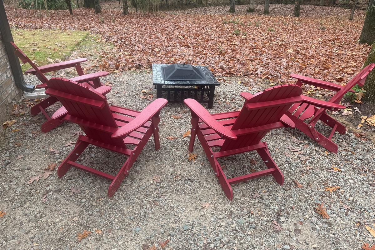 Fire pit with Adirondack chairs – perfect for evenings around the fire under the stars