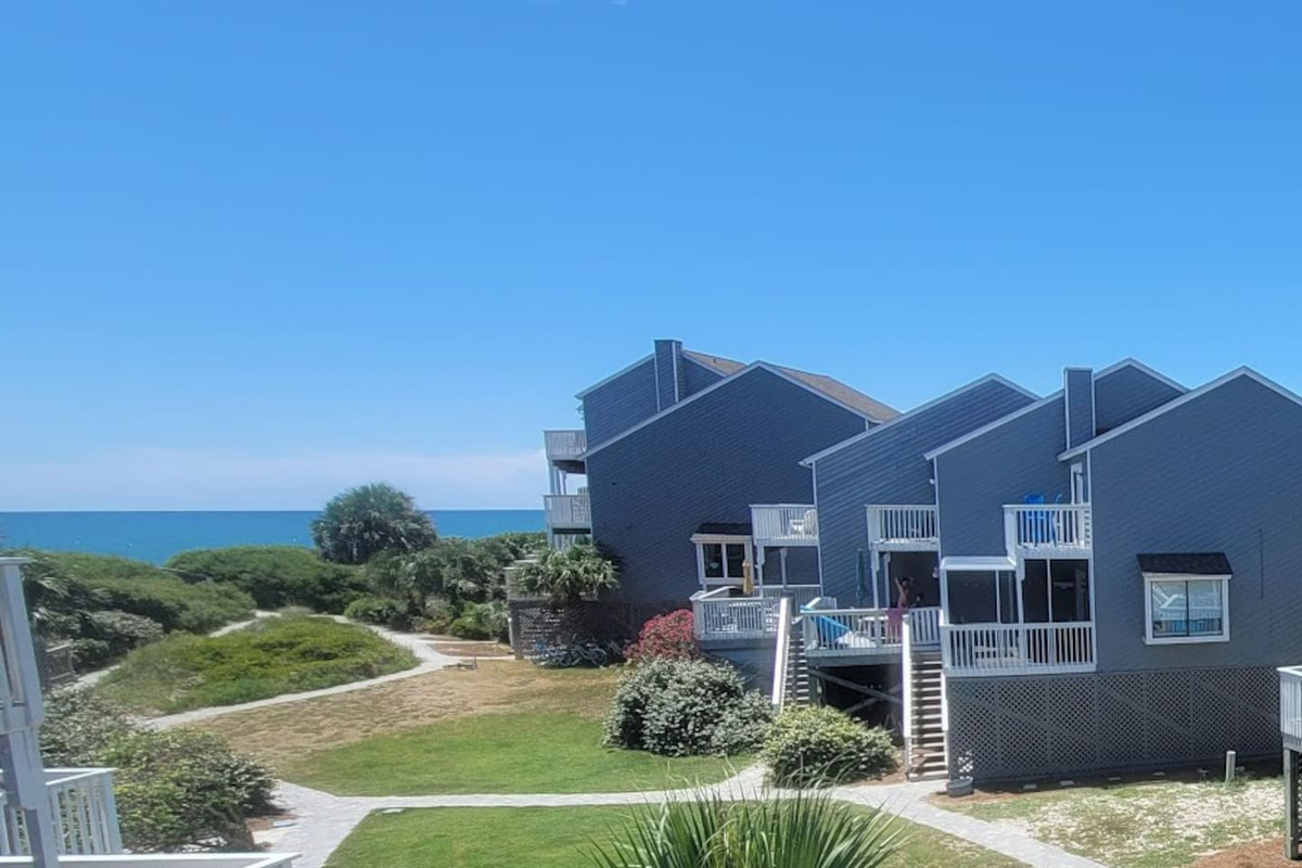 Your private master deck view waits every morning &mdash; step out with coffee and let Cape San Blas do the rest.