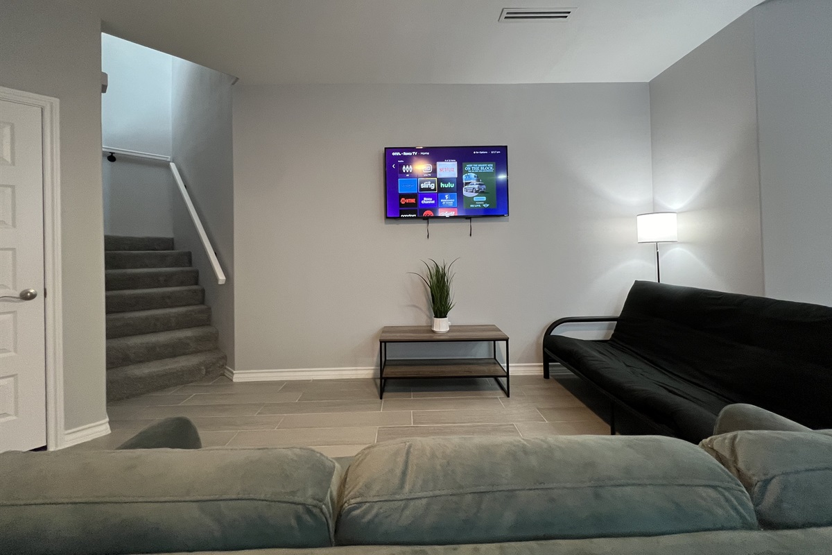 Living Room with Smart TV and Futon
