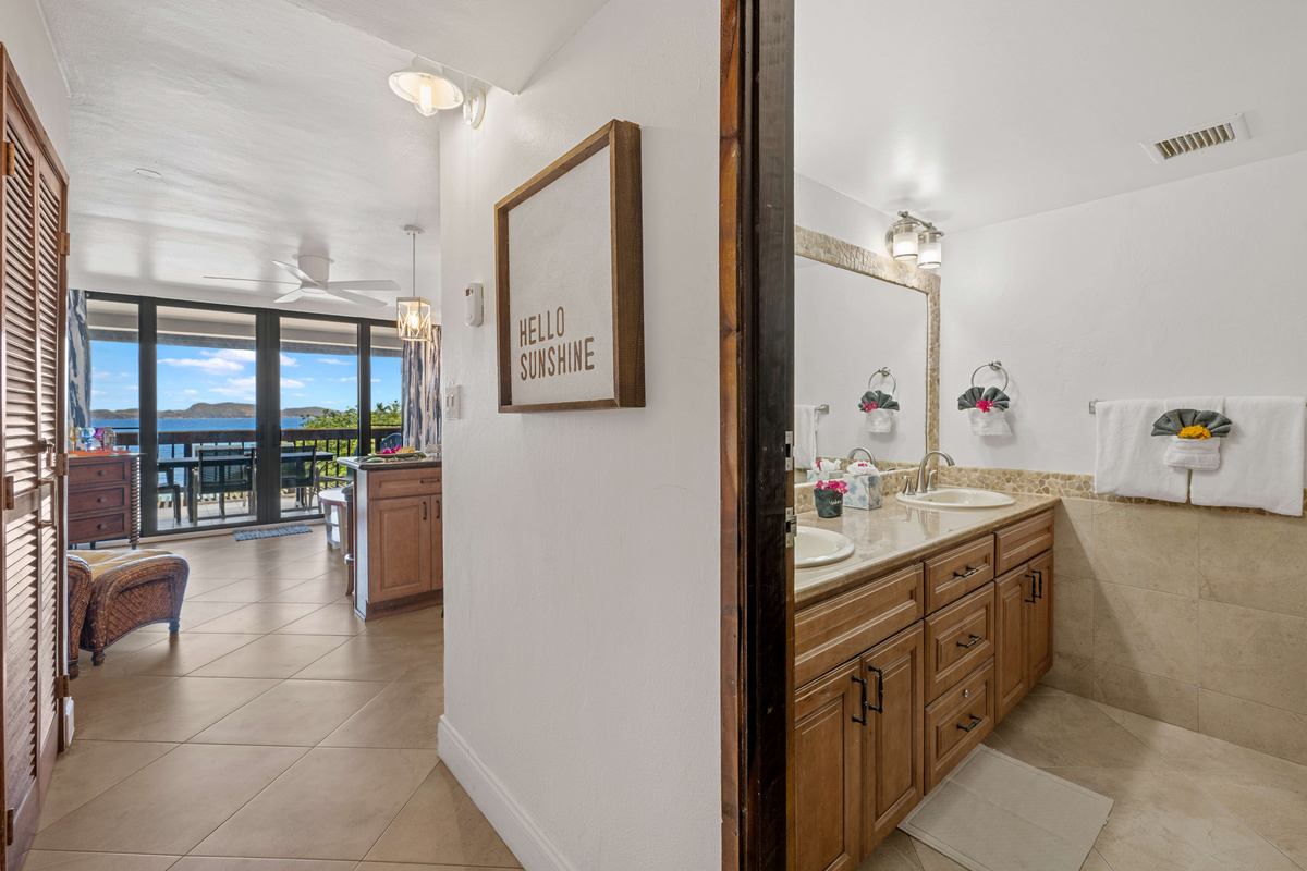 Convenient hallway leading to the first-floor bathroom.