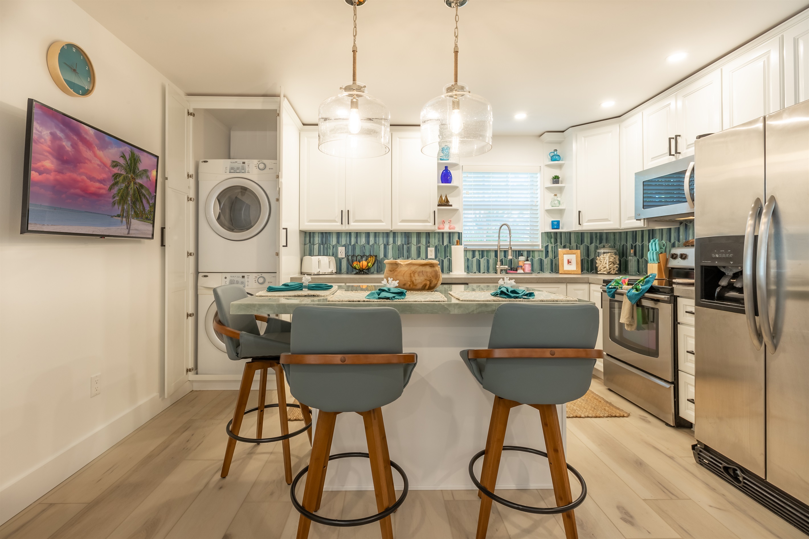 Kitchen: Modern appliances and stylish seating create the perfect space for culinary adventures!