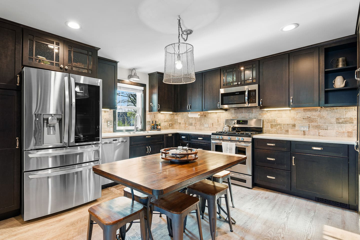 Open kitchen and dining area with space for shared meals and conversation.