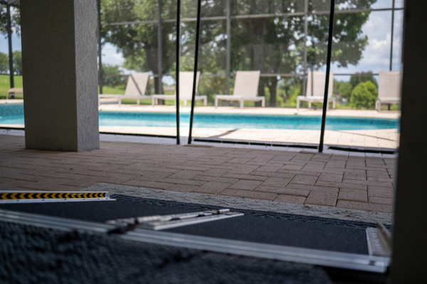 Pool door alarm & pool safety fence; Accessible ramp provided upon request