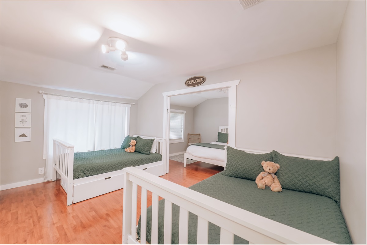 What could be more fun than the "kid camp" bedroom? This fun-filled room features two double beds with twin trundles, perfect for little adventurers. A Pack 'N Play is conveniently available for your use. 