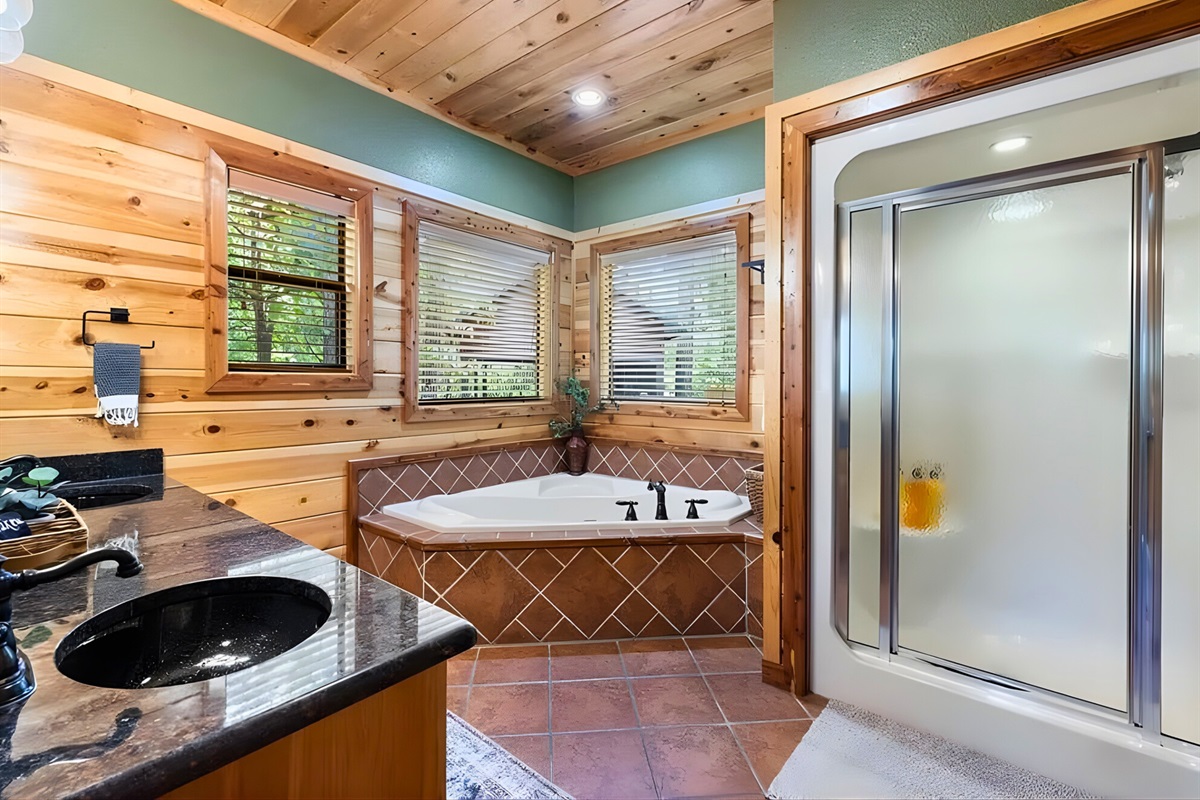 After a long day, the soaking tub and walk-in shower are waiting.