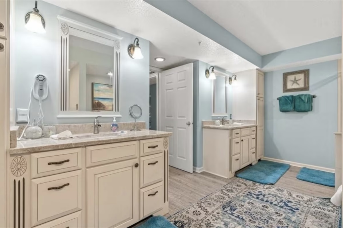 A view of both sinks in the primary bathroom, allowing you and your partner to get ready at the same time. No lack of space!