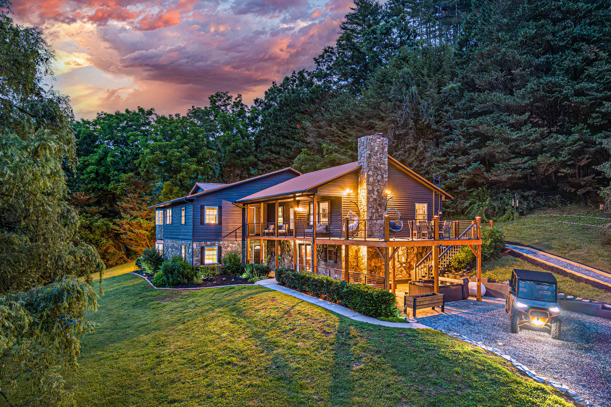 Exterior Retreat: Stunning mountain views await at this beautifully lit retreat!