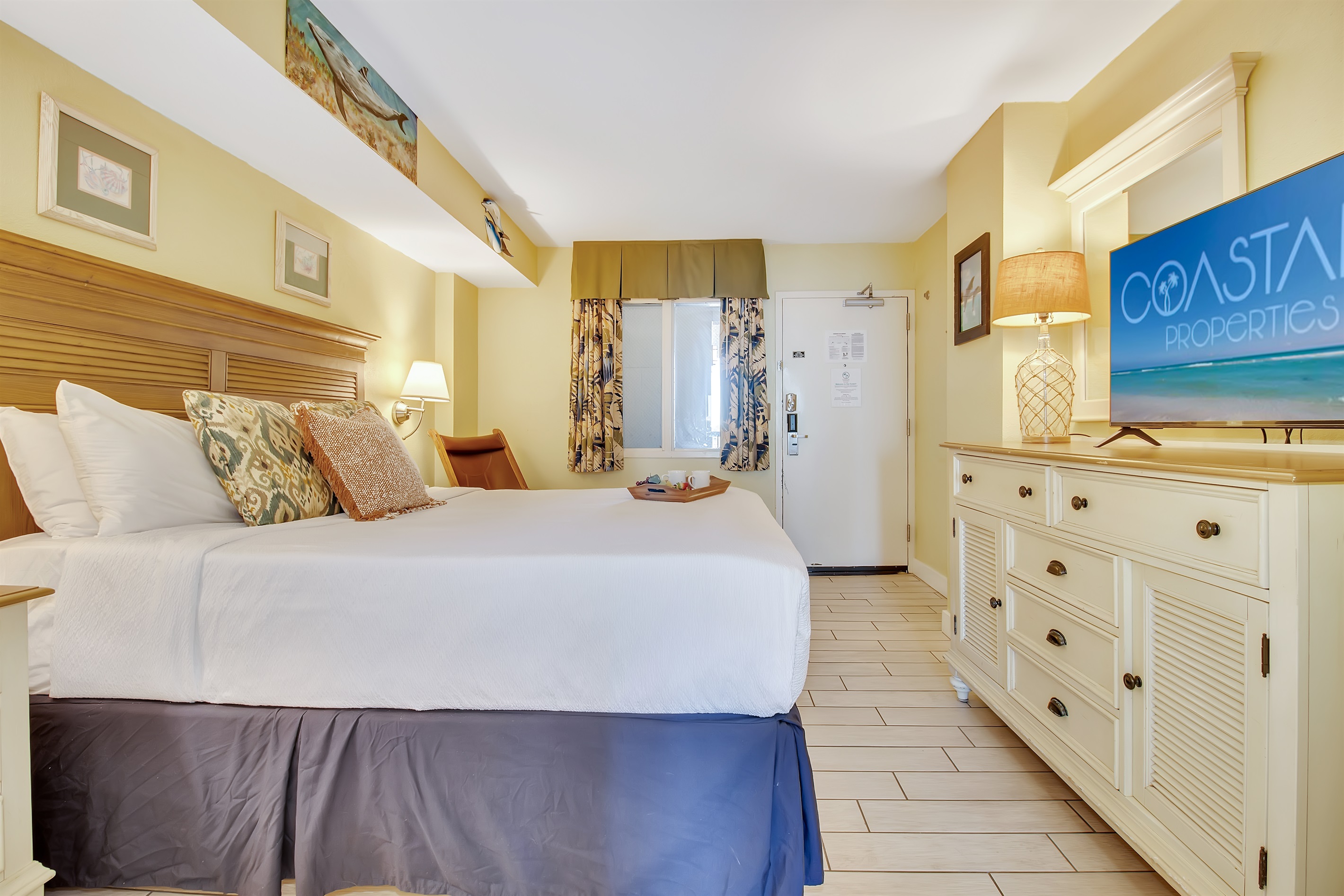 Relax in comfort with soft linens and a calm coastal vibe