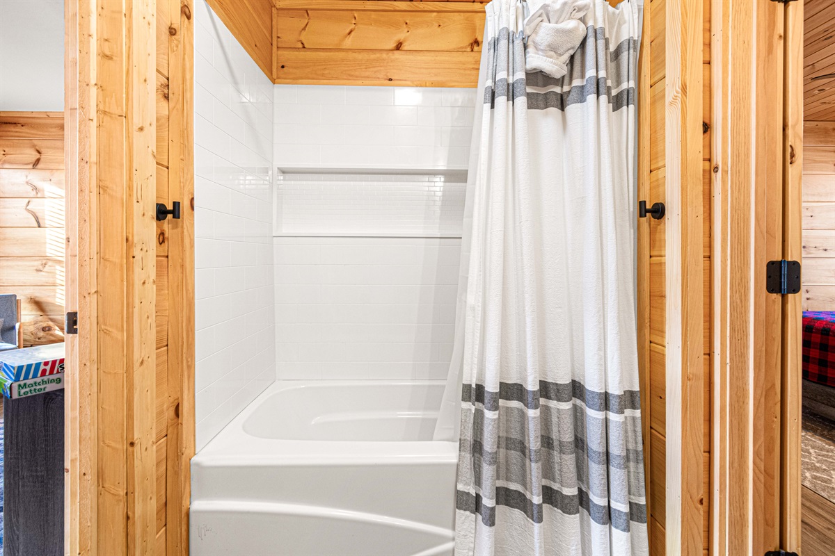Another full bath shower combo upstairs