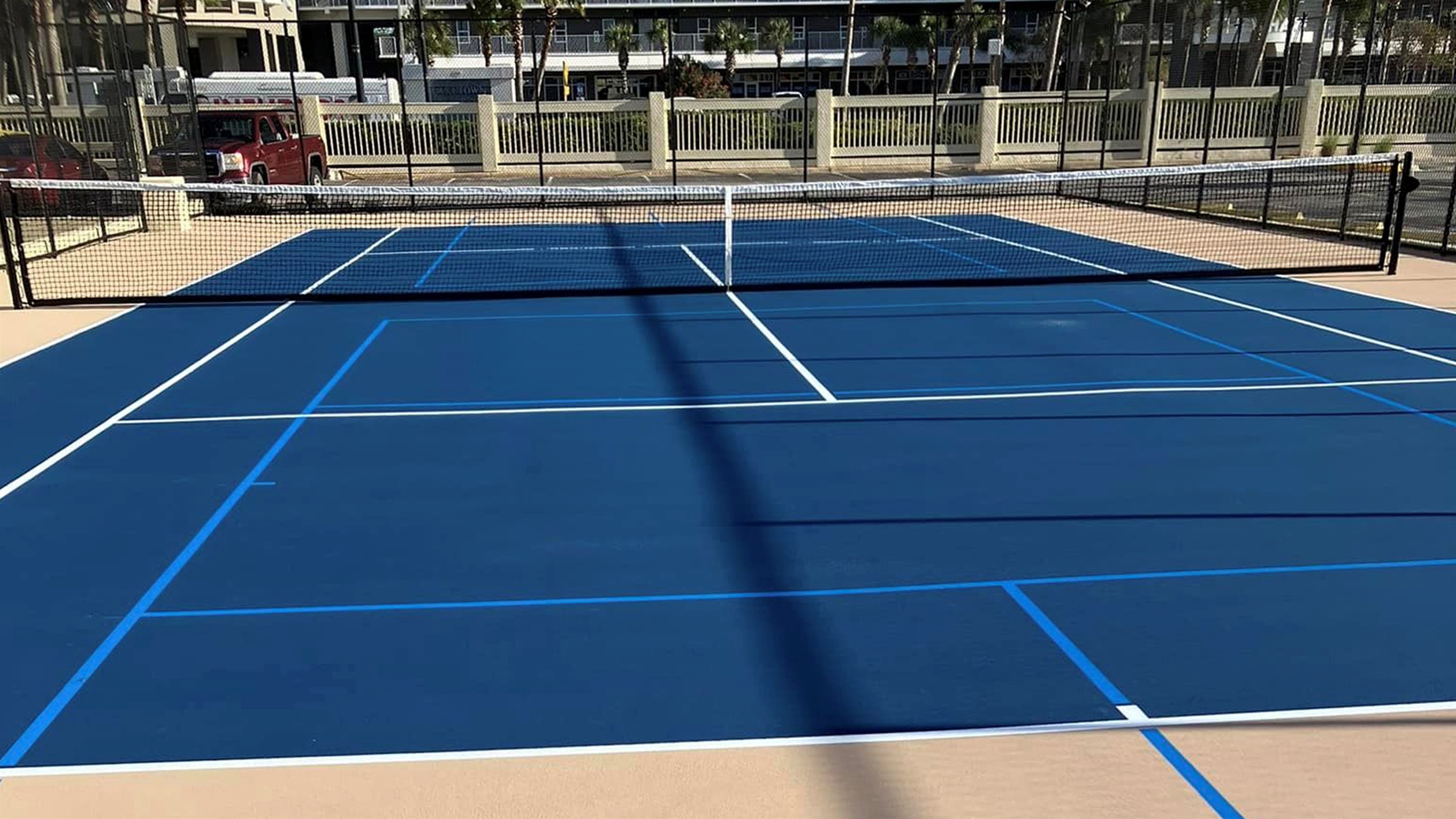 Brand New Tennis Court with Lines for 2 Pickle Ball Courts