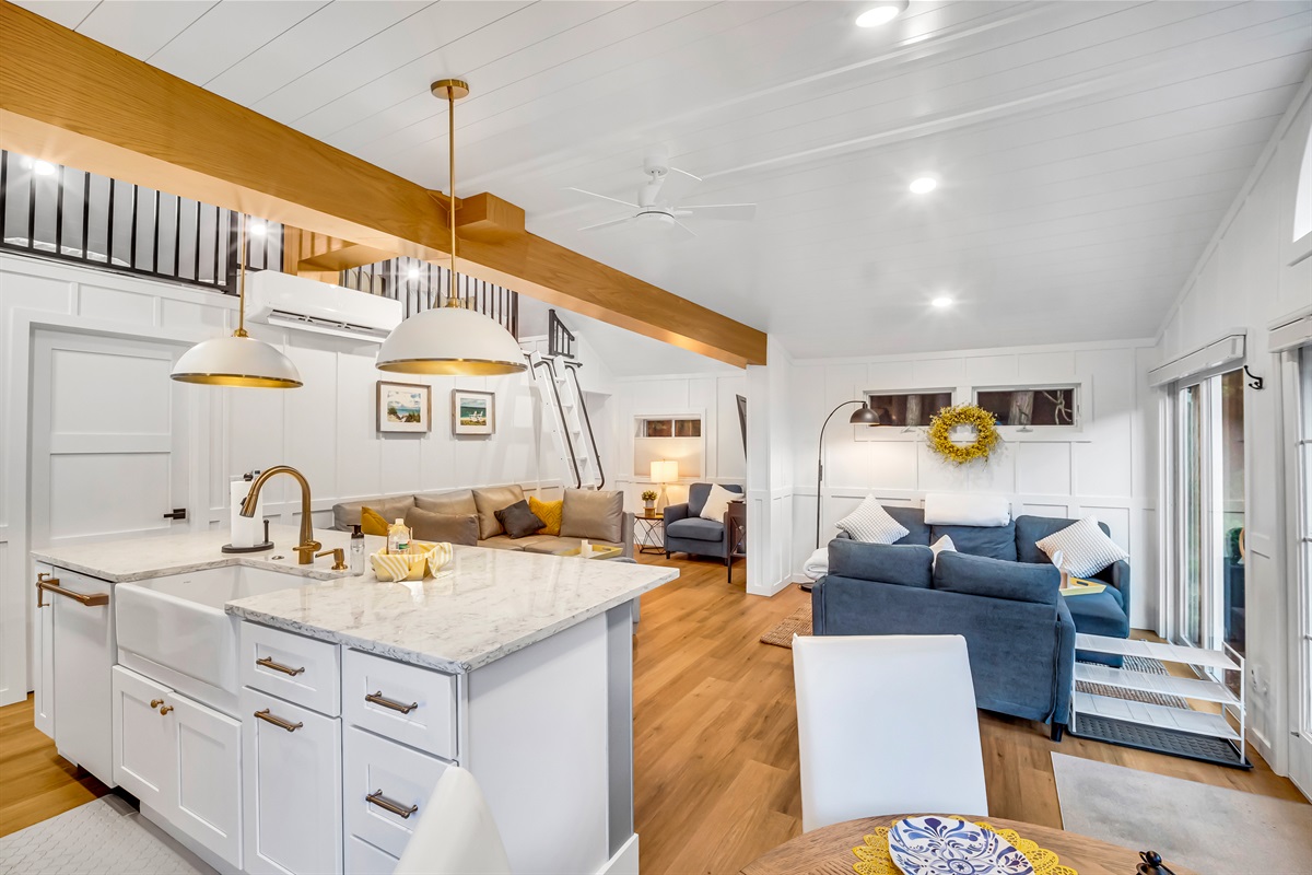 Open concept with 2 large seating areas, dining table for 4-6, and counter seating for 4 