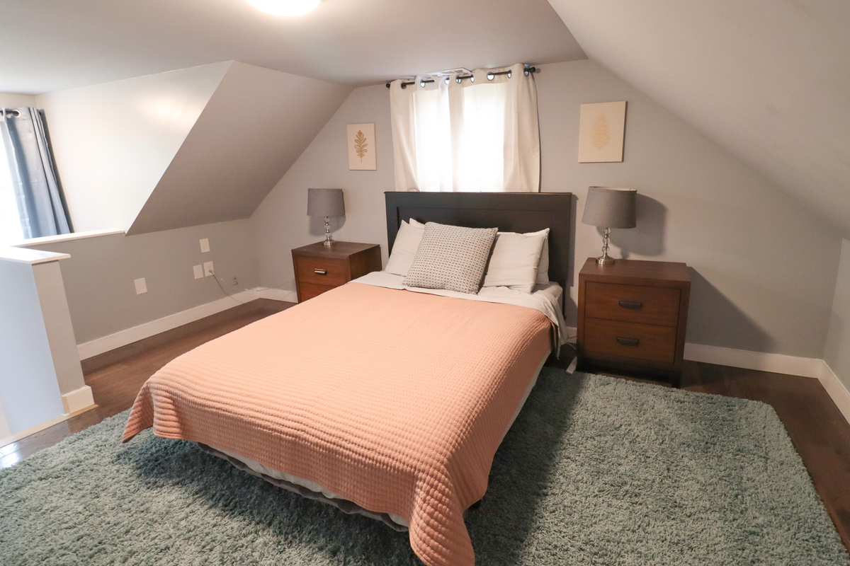 Attic Bedroom with sloped ceilings
