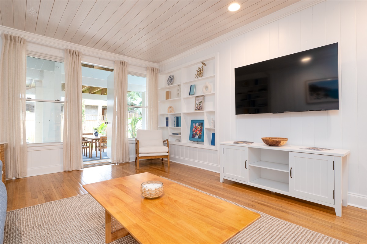 Airy and designed for gathering - this living room is perfect for movie nights