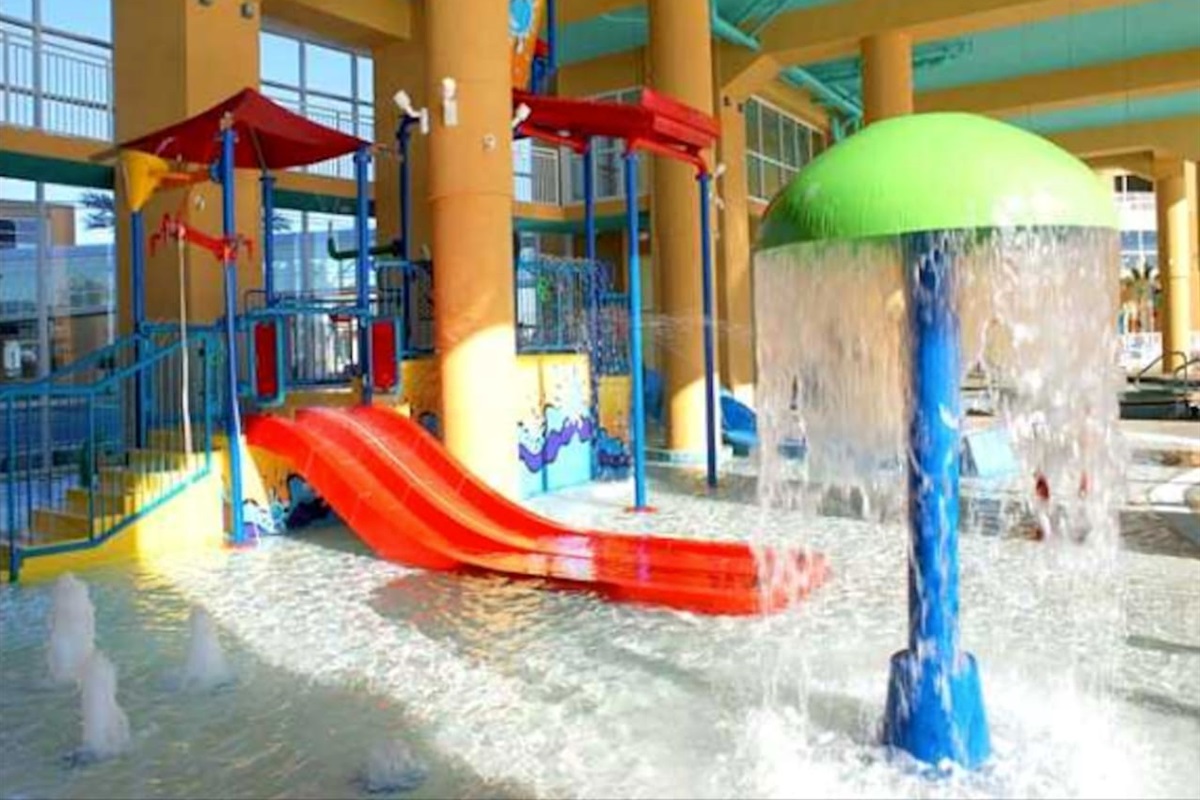 Wonderful fun with kid's water park area featuring slides, spray toys and water bucket!