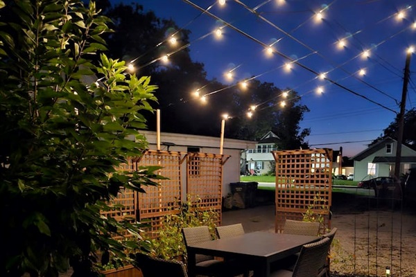 Enjoy dining under the lights in the garden.