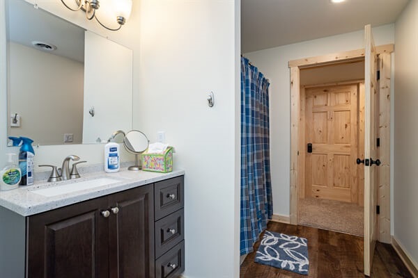 Bathroom 3 is located in the lower level and has a tub/shower combo for baths for the little ones