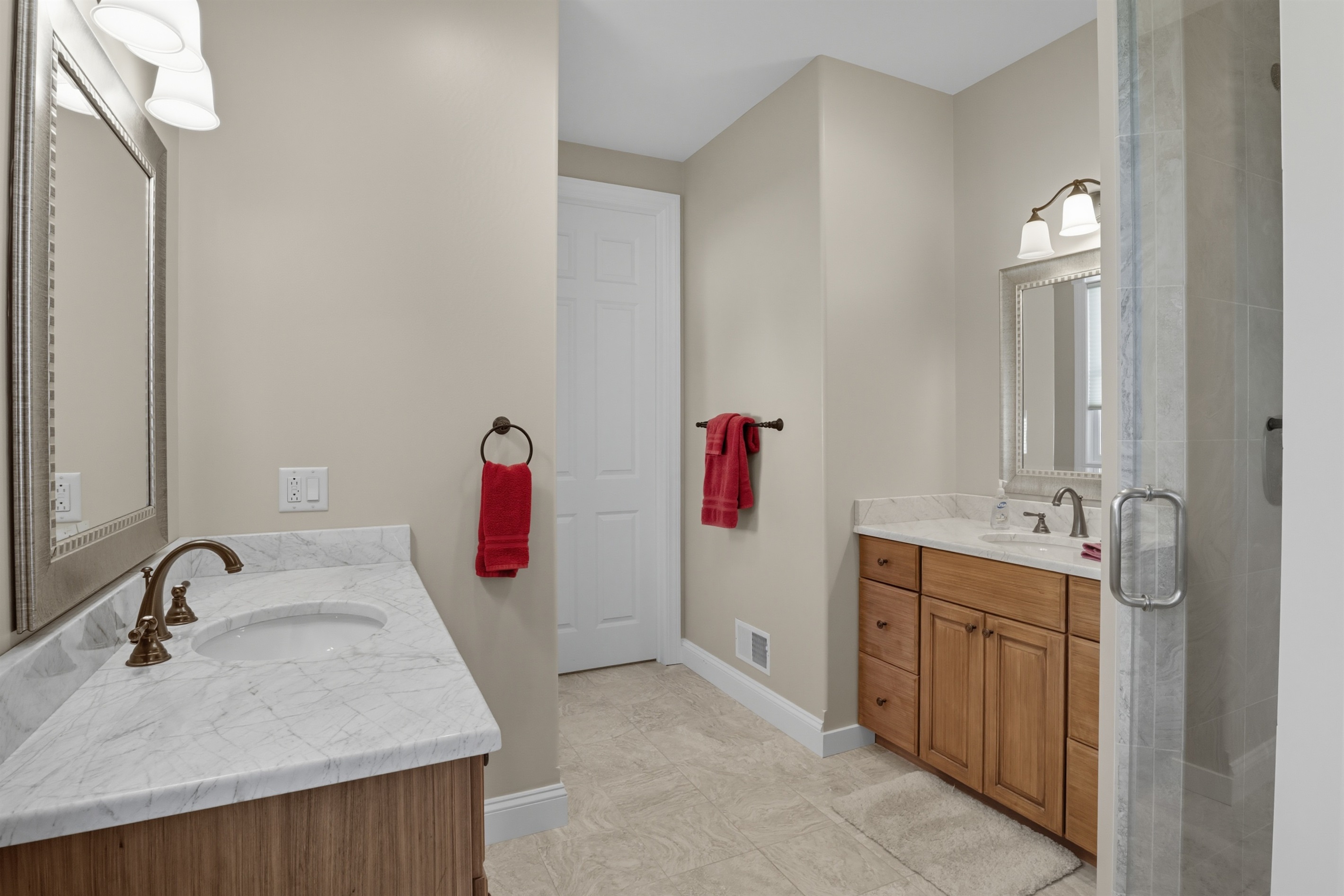 Modern second floor master bathroom with double sinks and walk in shower. Bathroom #1