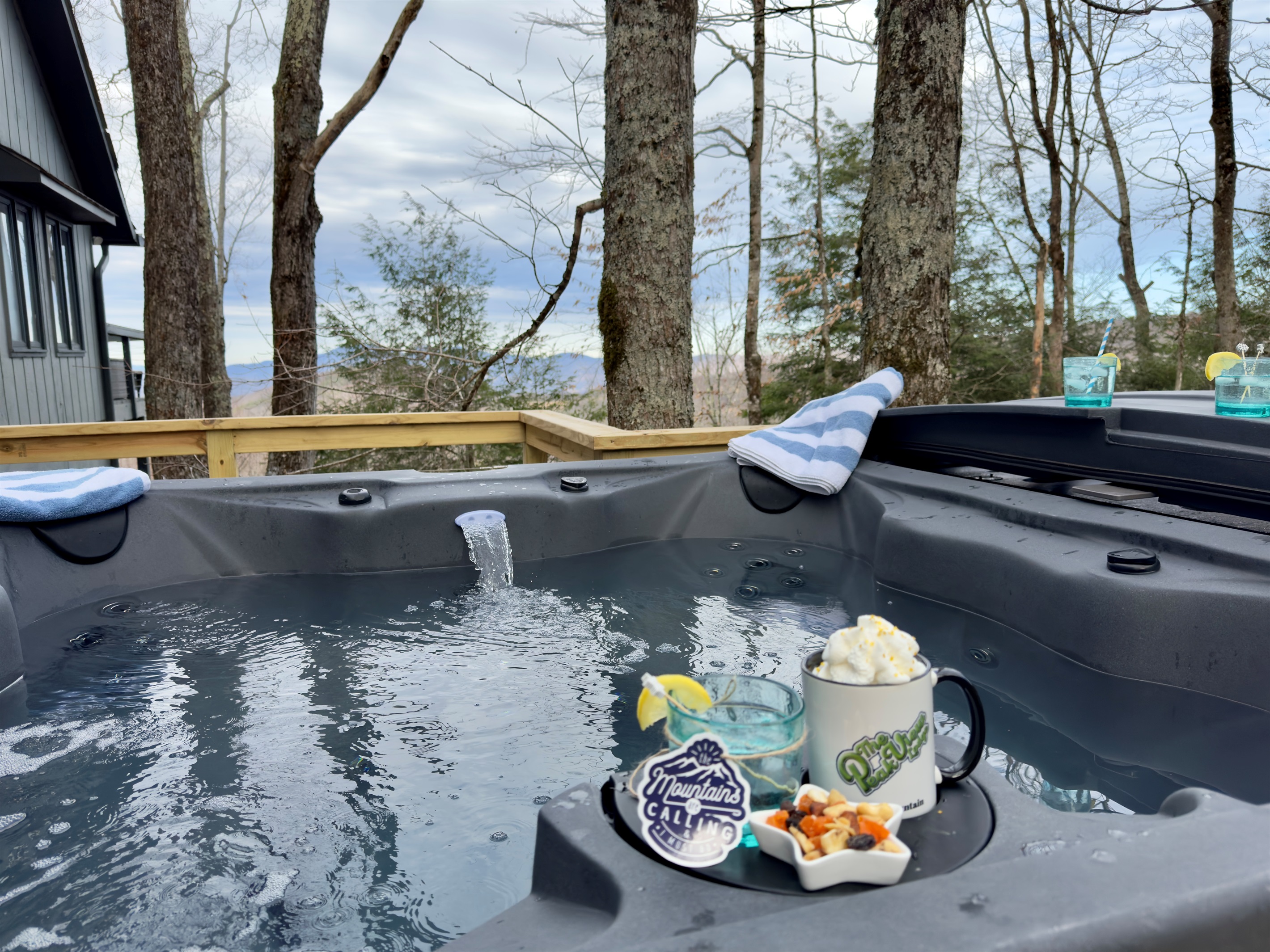 Submerge in the hot tub and soak in the breathtaking view. And maybe see a few deer walking by...