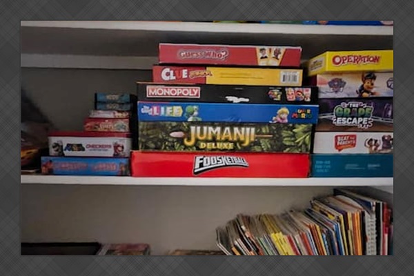 Closet treasure trove of books and board games, perfect for gamenights, cozy reading sessions, and keeping little ones entertained.