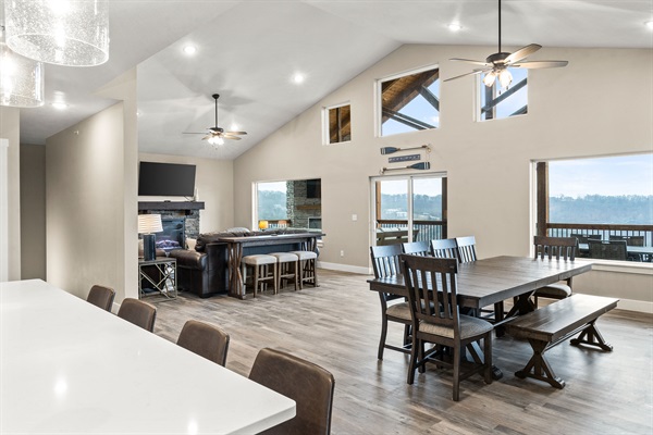 Dining Room and Living Room. Dining table seats ten. Sliding glass door to the upper deck. Plenty of windows for viewing Table Rock Lake.