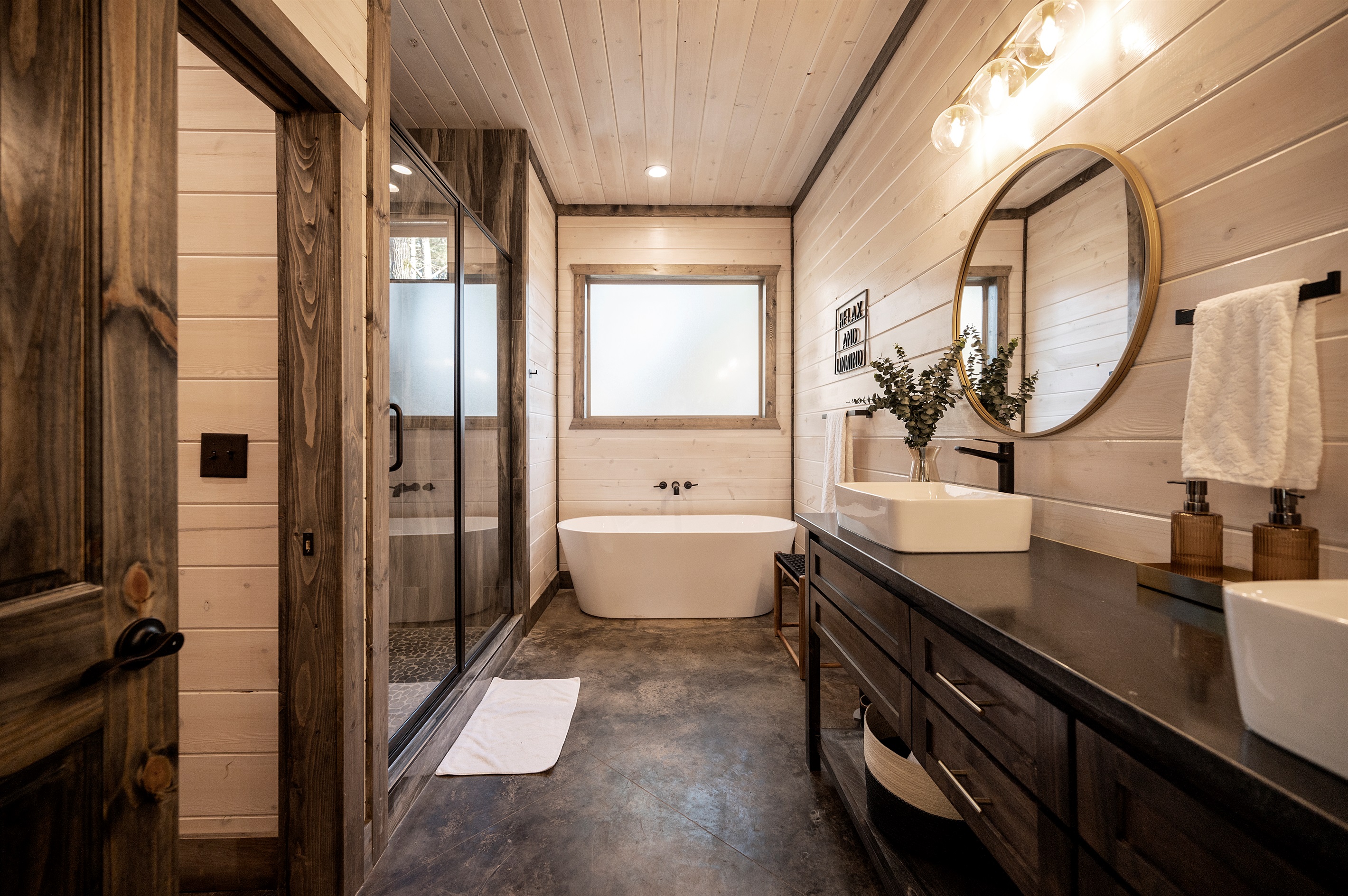 Unwind in the private ensuite featuring a relaxing soaking tub