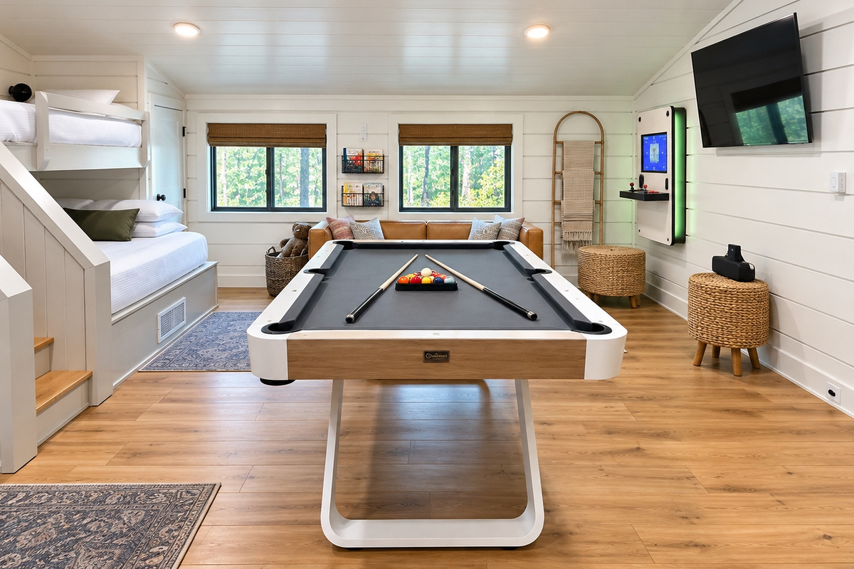 This bunk room doubles as a game room with arcade, TV, Karoke, pool table, giving your crew a space to play, laugh, lounge, and make the kind of memories that become everyone’s favorite part of the trip.