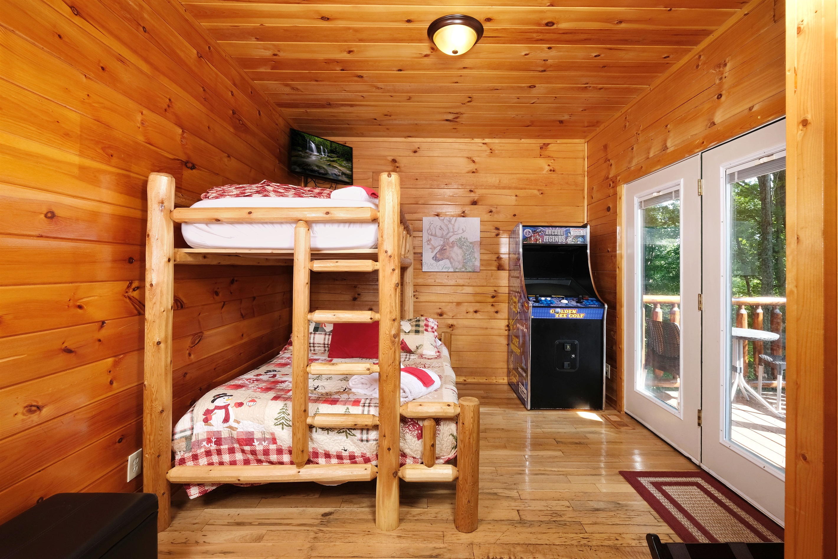 Bunks off game area, curtain for privacy