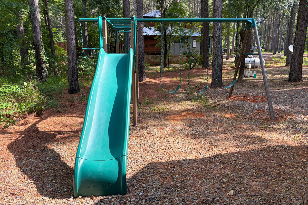 Let the kids burn off some energy while you relax nearby and take in the peaceful wooded setting.