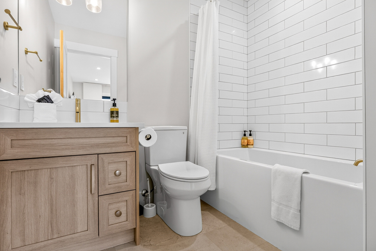 Bathroom with Bath and Shower | Fernie's Artisan Soco Soaps Throughout