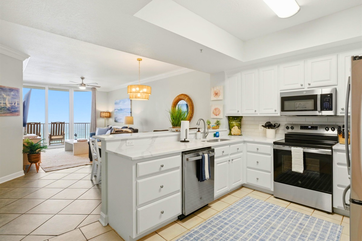 Crisp white cabinetry and a functional layout make this kitchen both stylish and practical for your stay.