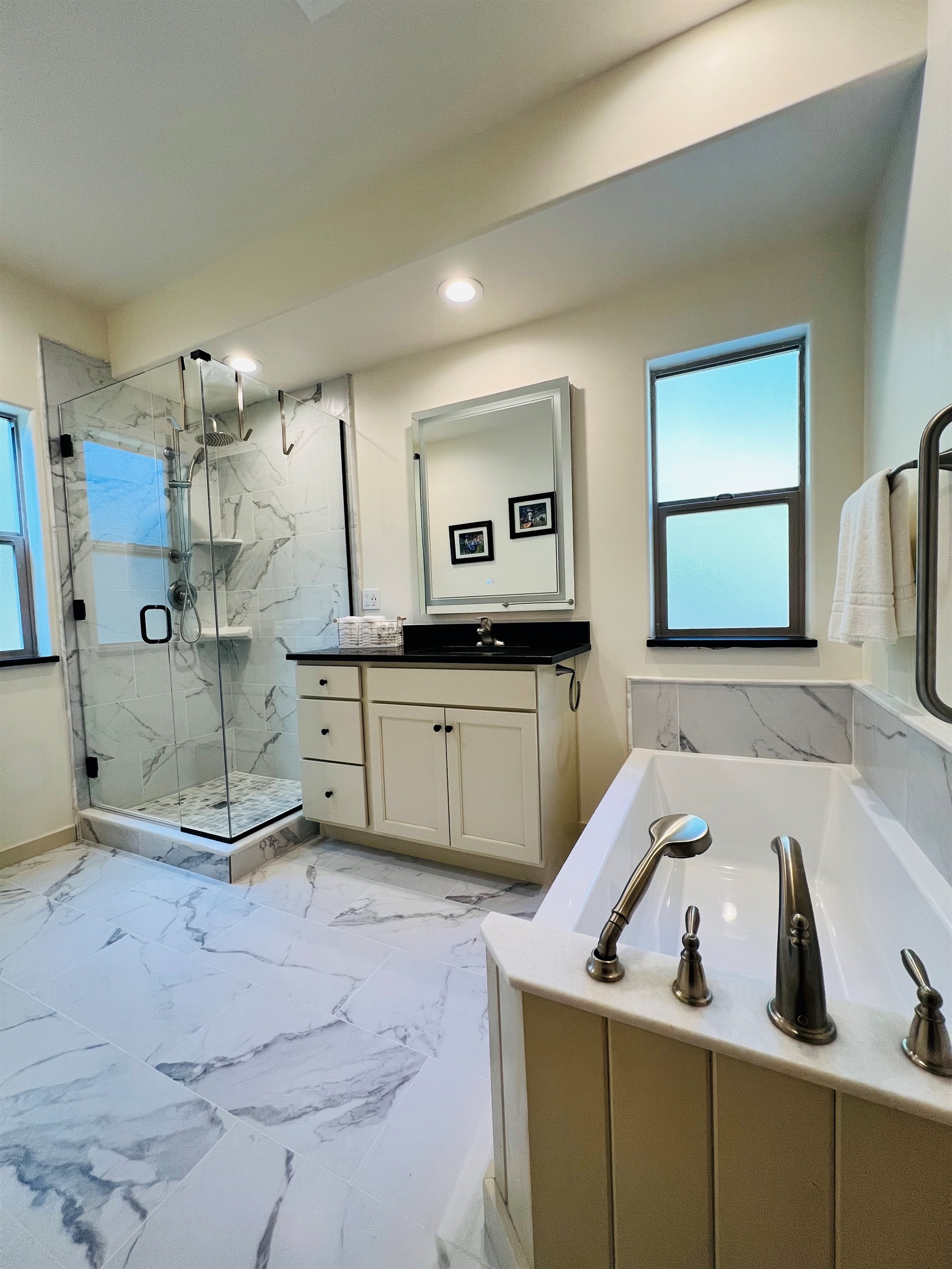Beautiful, deep soaking tub with hand-held showerhead makes washing your hair in the bathtub easy.  Always nice after a day of hiking, biking or sightseeing.