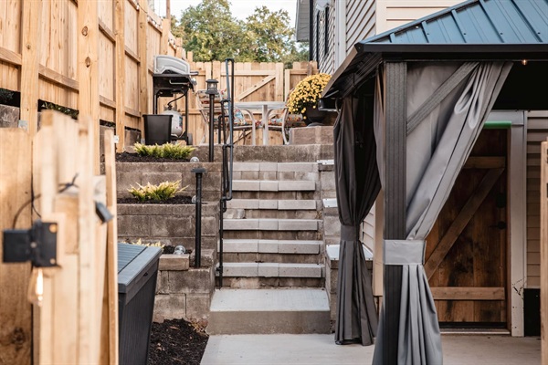 Stairway from hot tub area to patio.
