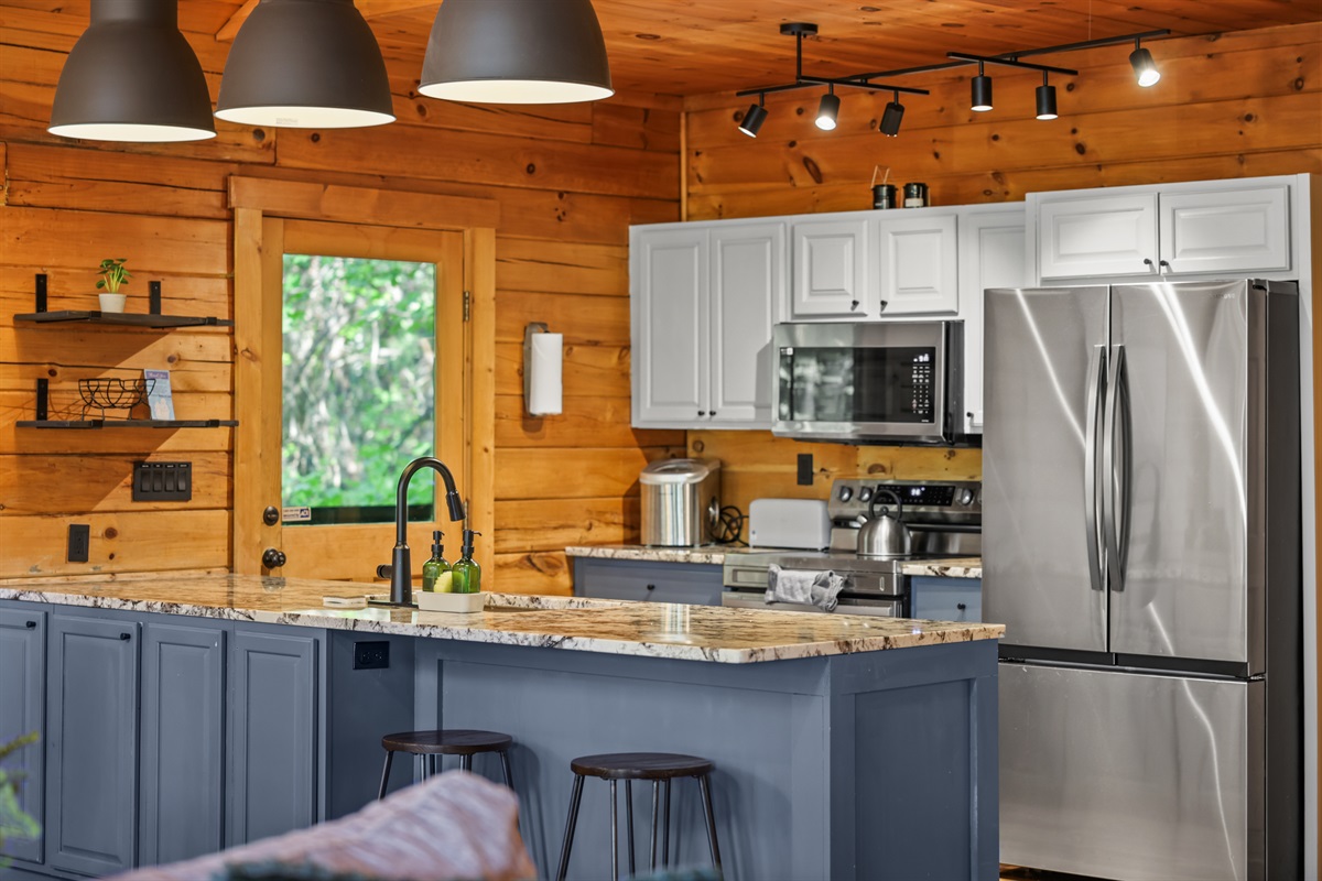 Updated kitchen with granite countertops and new appliances