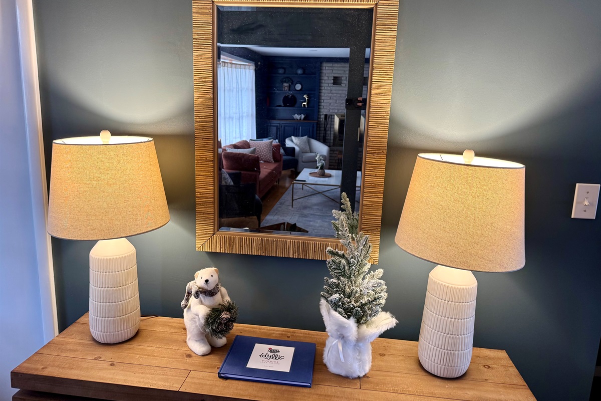 “Warm welcome at Idyllic Sunrise Lakehouse — a taste of the cozy, thoughtfully designed spaces throughout the home.”