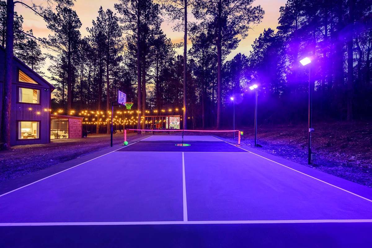 Sport court, outdoor projection screen, playset and screened in porch.