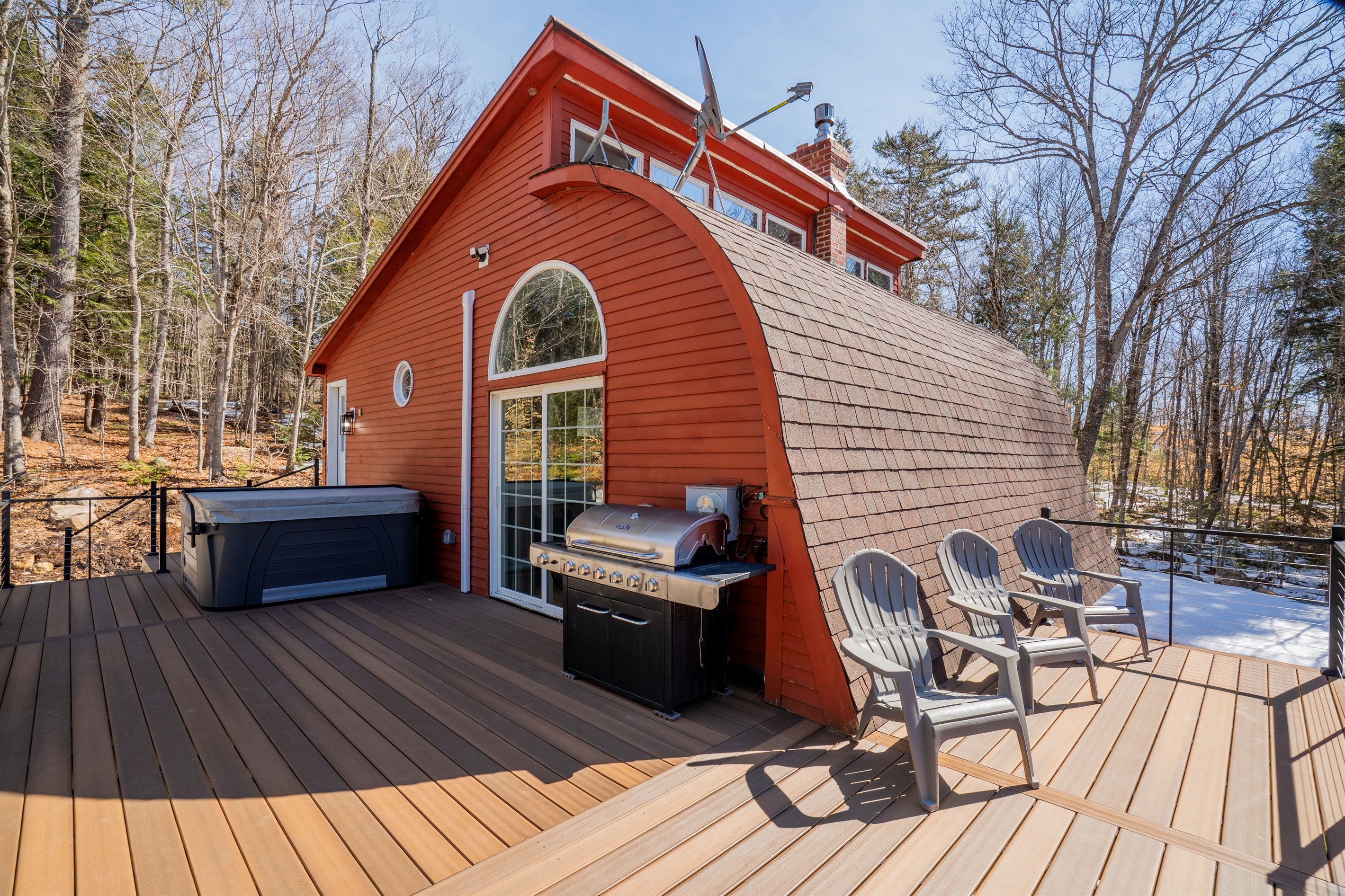 Sizzle and soak: grill up a feast just steps away from the hot tub for the perfect evening under the stars.