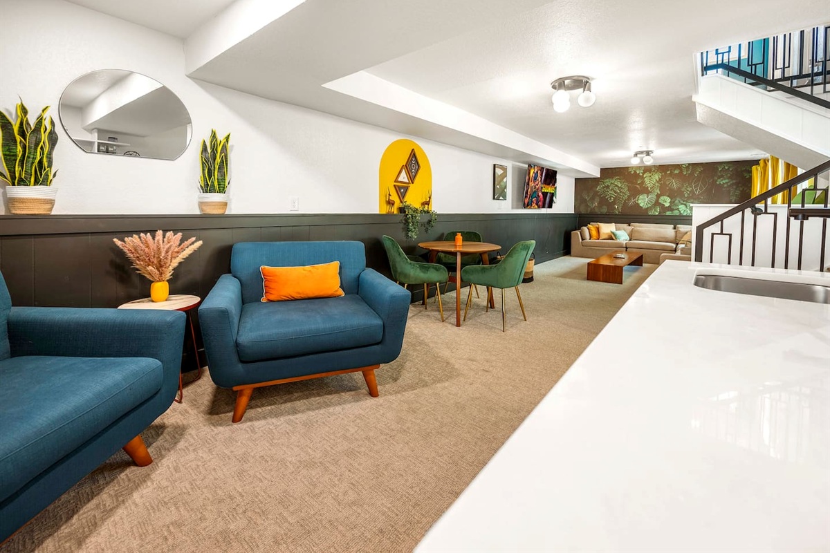 Retro inspired lounge with mid century vibes perfect for catching up.
