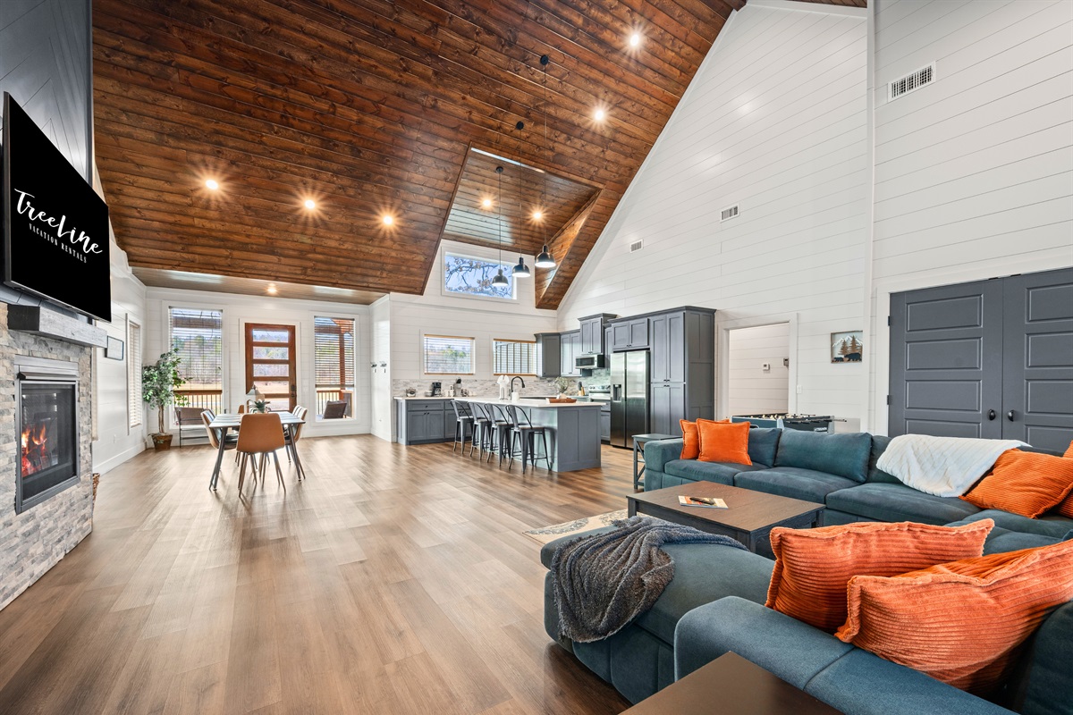 Wide open and full of natural light, the main living area blends modern comfort with classic cabin charm in the best way.