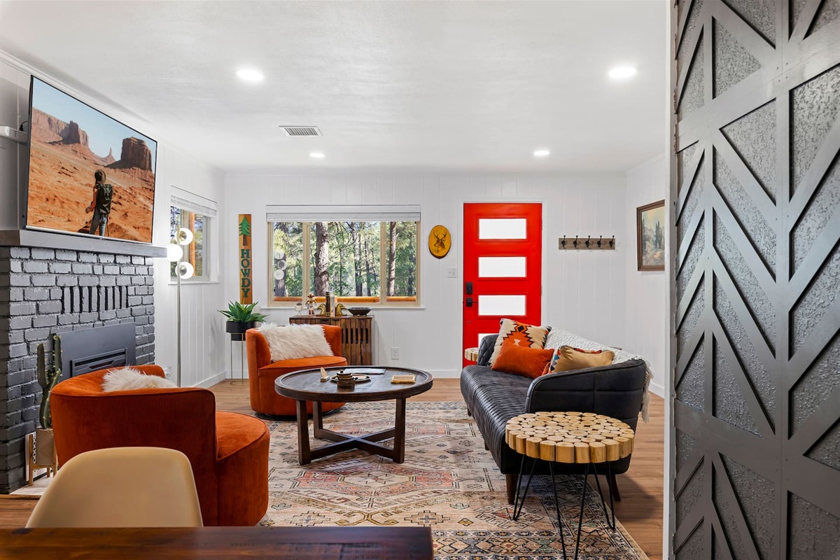 We blended a lot of textures in this cabin from brick, textured and smooth walls, wood paneling, hardwood floors and textile rugs, and on and on and on.
