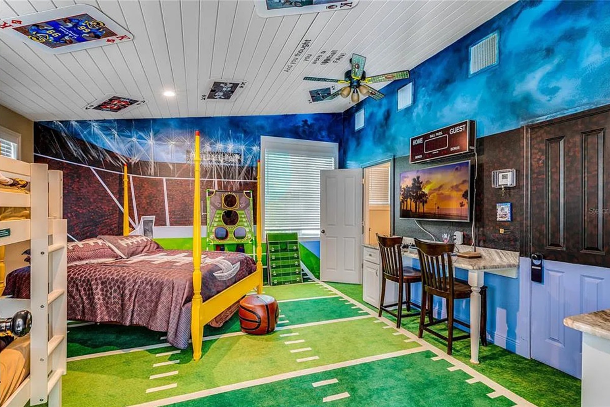 Touchdown! Our football-themed bedroom is a favorite for sports fans
