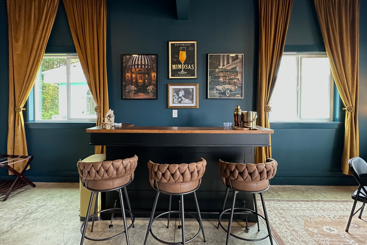 Pull up a velvet stool and let someone else make the drinks tonight — the speakeasy bar is stocked and ready the second the first cocktail order comes in.