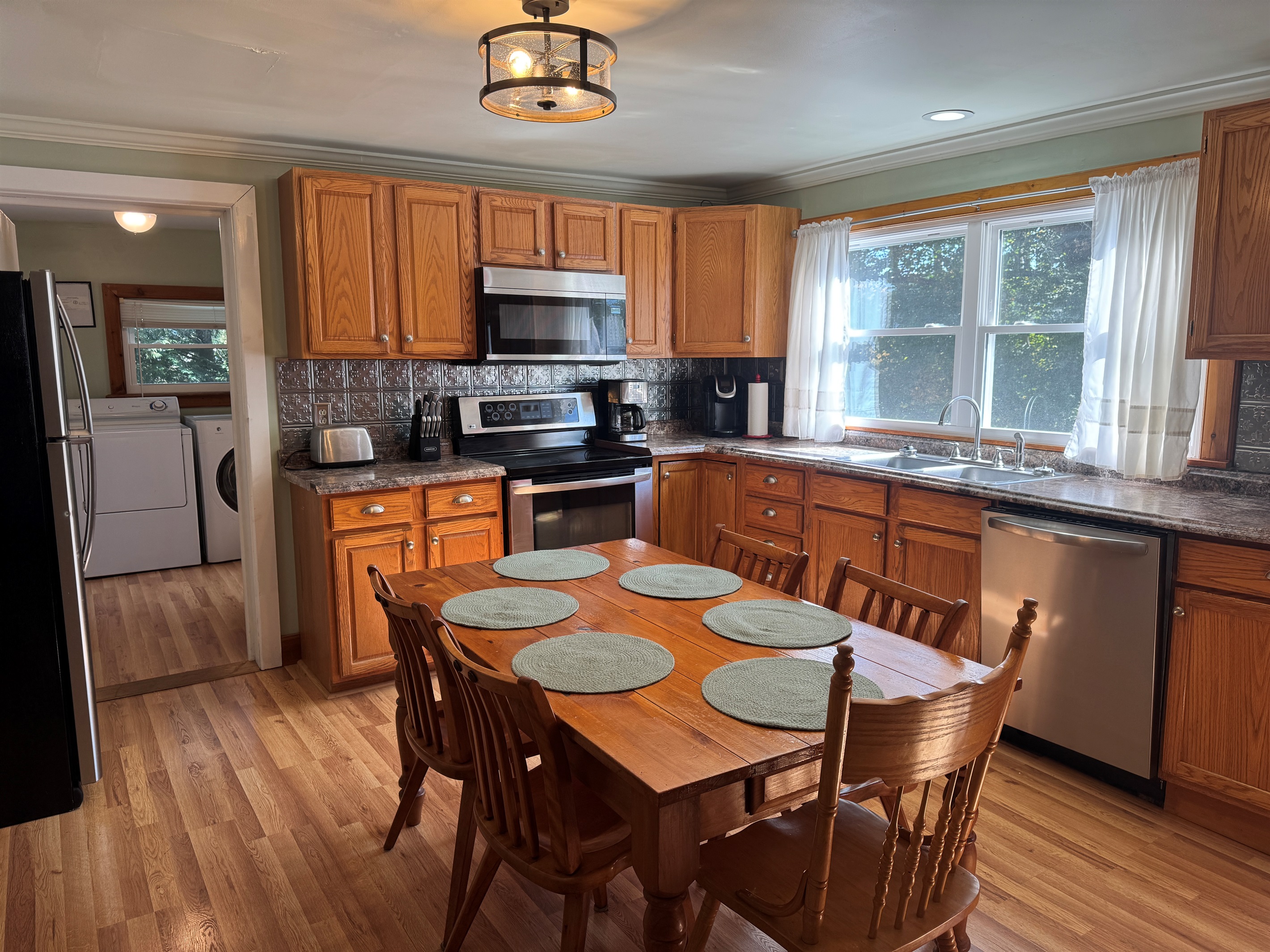 Kitchen with laundry room beyond