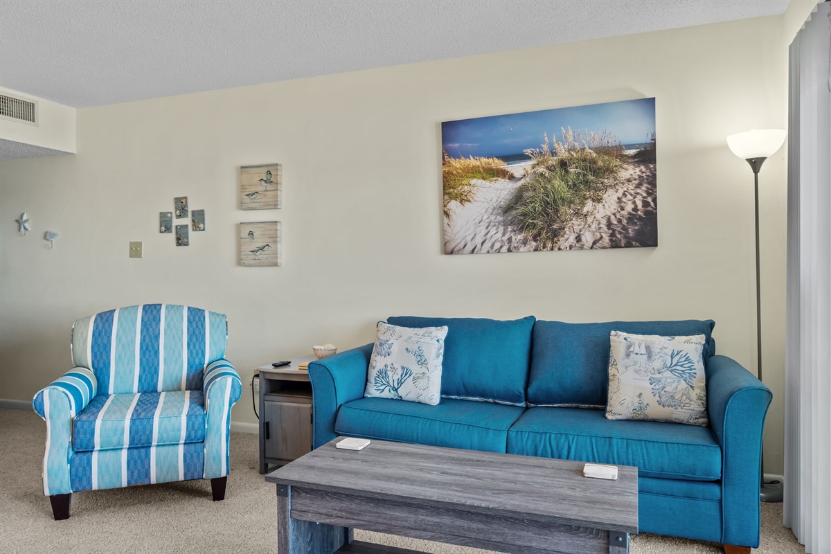 Beachy living room with comfortable seating, coastal d&eacute;cor, and plenty of space to unwind or gather