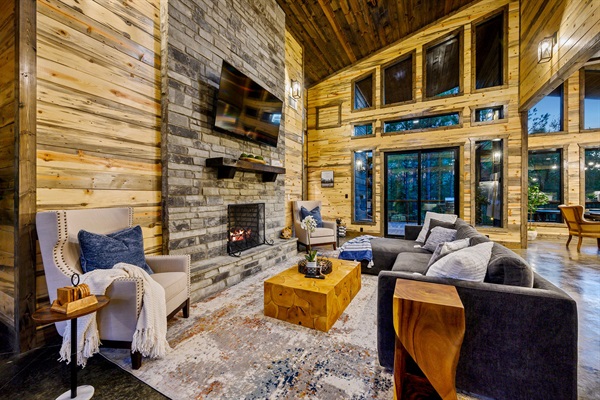 Modern rustic elegance meets floor-to-ceiling forest views.