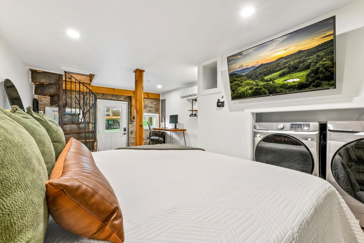 Master Bedroom with King Bed, 42-inch Smart TV, sound machine, blackout curtains and desk with computer monitor.   Full size washer/dryer with detergent provided.
