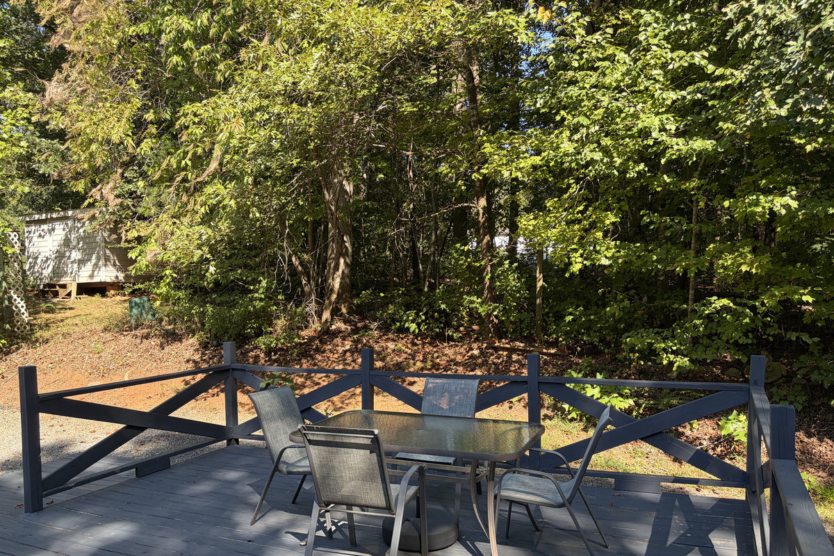 Private wooded back deck area