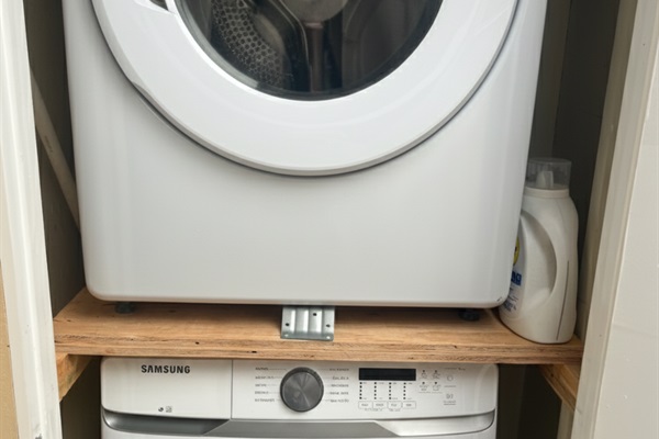 There is a free shared washer/dryer right outside of the unit