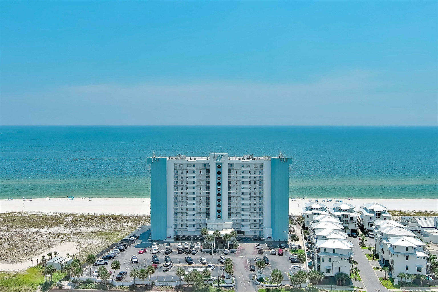 Right on the Beach... just steps to the sand - No long boardwalk!  Quick walk to Coastal! 
