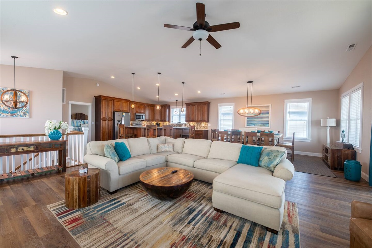 An open concept floor plan with plenty of seating for dining or lounging on the sofa... 